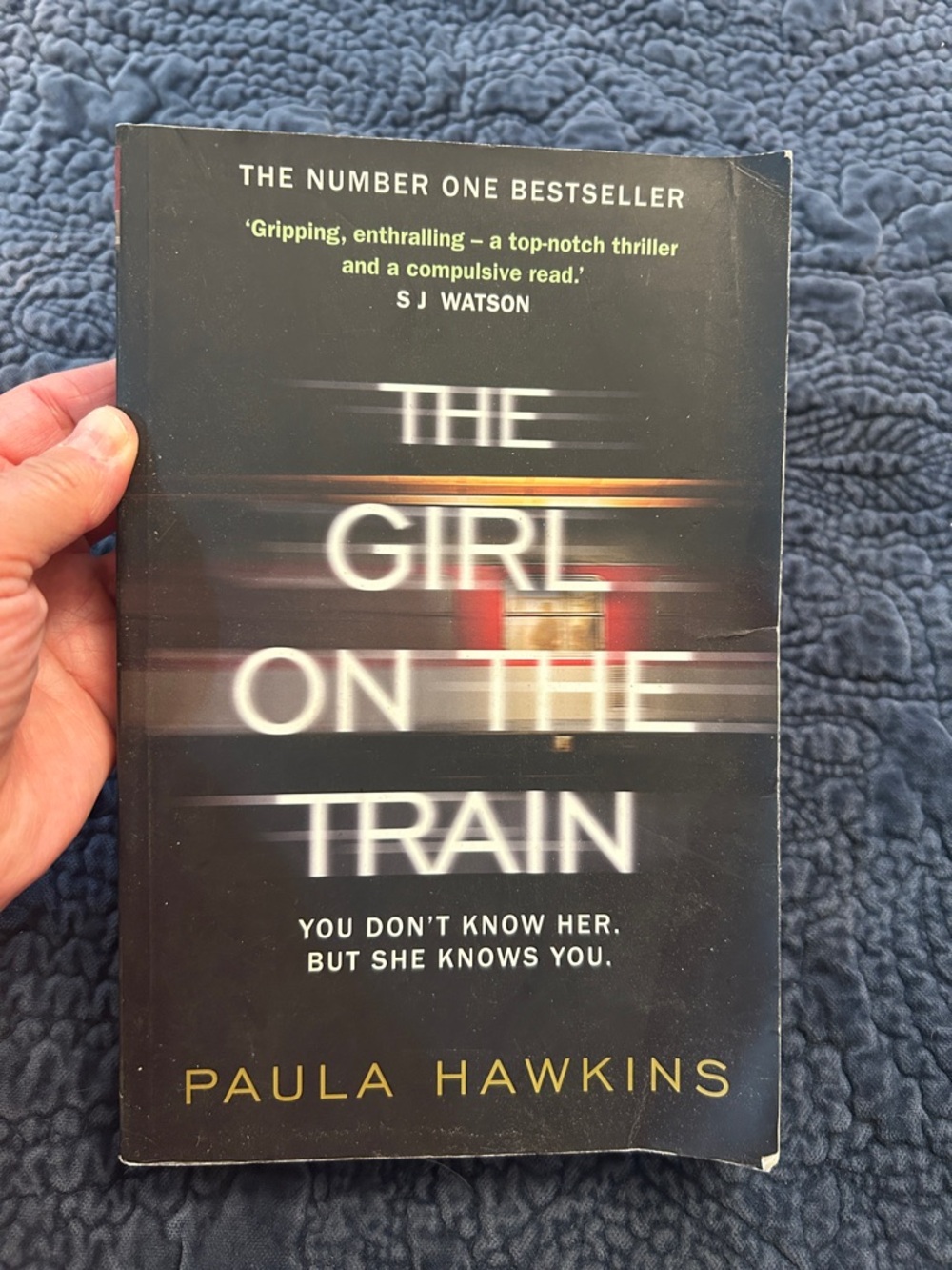 The Girl on the Train by Paula Hawkins - Black with Gold Title